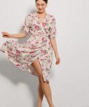 Light beige summer wrap dress with a floral pattern.