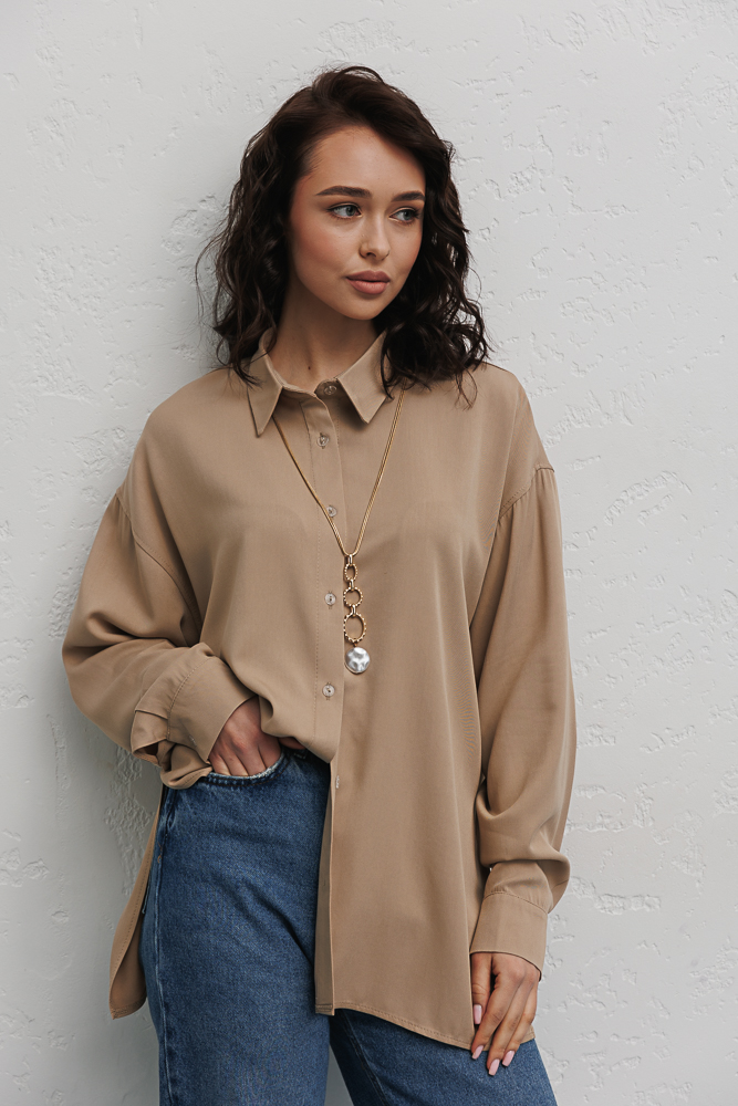 Elongated oversize beige women's shirt with slits on the sides