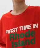 Women's light red oversized t-shirt with the print "First time in Rhode Island?"