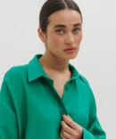 Women's oversized green shirt with a crinkled texture