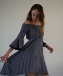 Dark blue white striped dress with a slit on the back