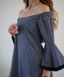 Dark blue white striped dress with a slit on the back