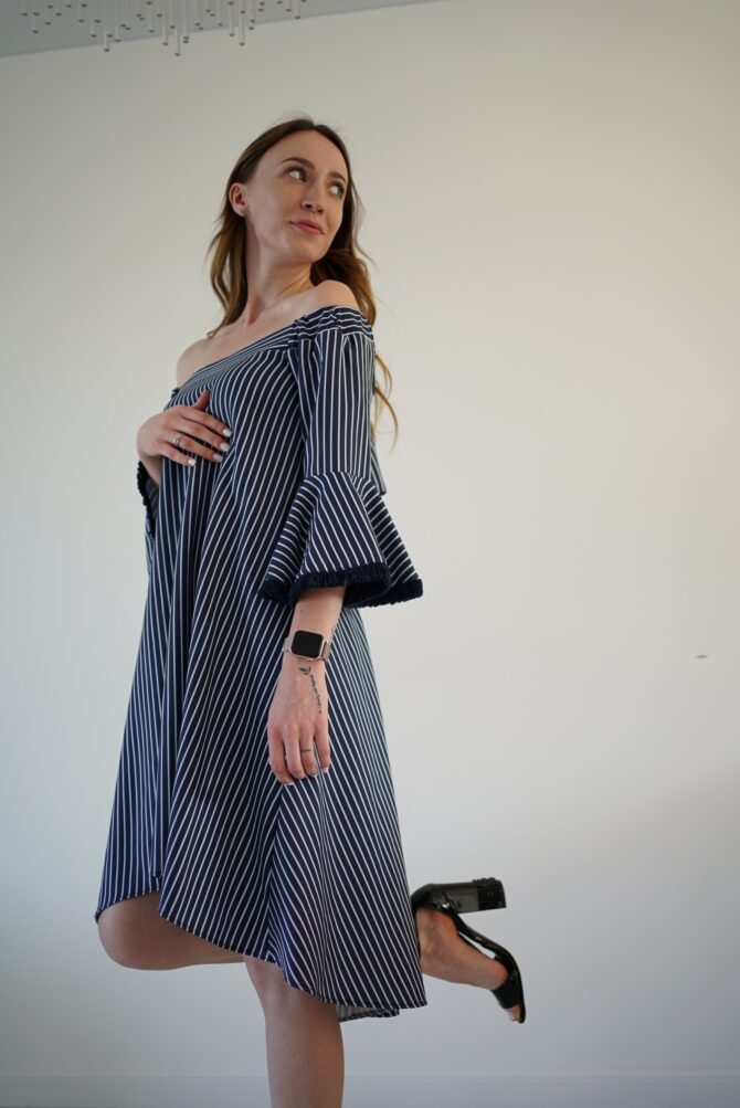 Dark blue white striped dress with a slit on the back