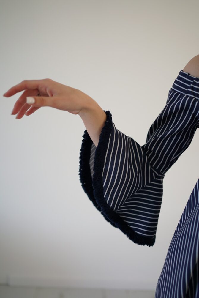 Dark blue white striped dress with a slit on the back