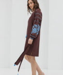 Short chocolate embroidered dress with blue cross-stitched roses on the sleeves.