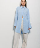 Women's long shirt blue with a semicircular bottom