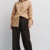Жіноча сорочка oversize бежева з кокеткою на спині