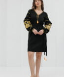 Black short embroidered dress with yellow cross-stitched roses on the sleeves.