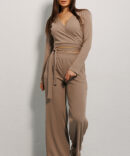 Knitted women's suit with trousers and cropped coffee sweater