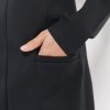 Коротка трикотажна сукня з кишенями чорна