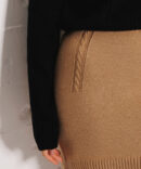 Knitted miniskirt dark beige with pigtails at the top