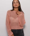 Lacy knitted sweater "Spider Web" in peach color