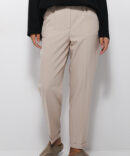 Women's beige slacks with cuffs at the bottom