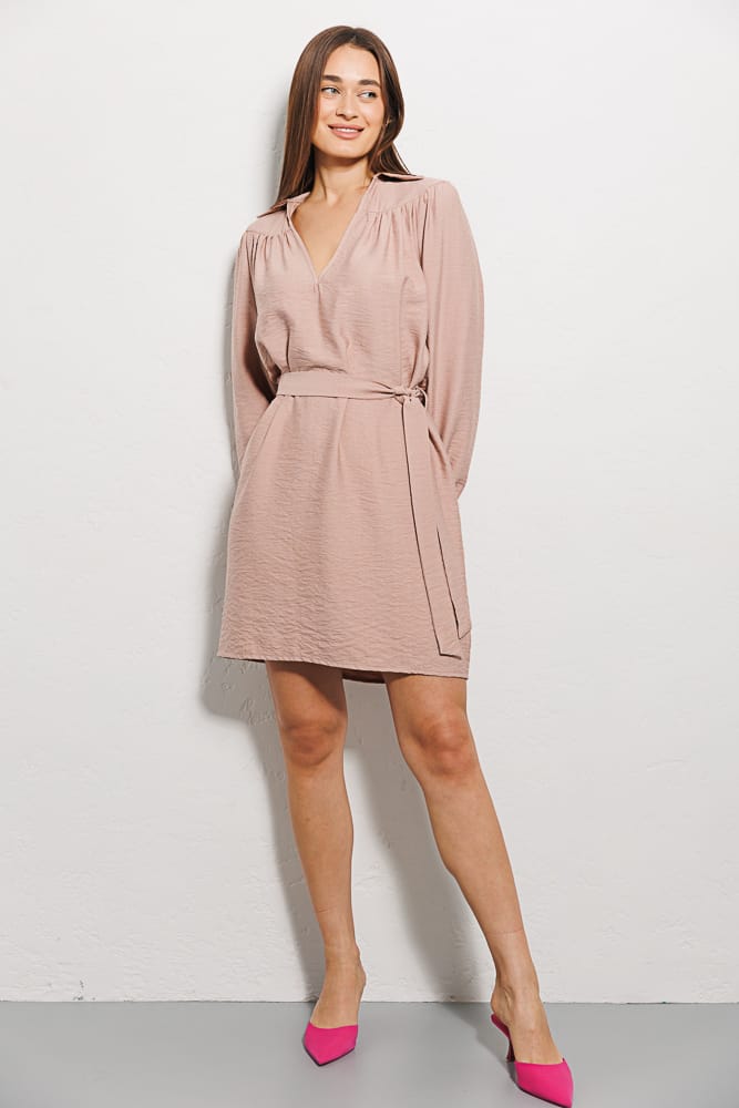 Short powder dress with long sleeves.