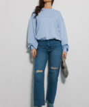 Women's oversize blue sweatshirt with a cutout on the back