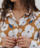 Mustard blouse with a sharp collar and flowers