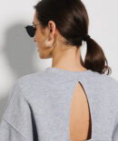 Women's oversize sweatshirt light gray with a cutout on the back