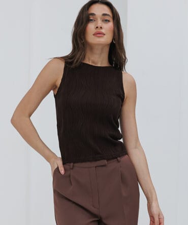 Pleated sleeveless top in dark chocolate color.