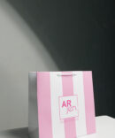 Cardboard bag Arjen pink with white stripes