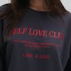 Жіночий світшот з принтом Self love club сірий