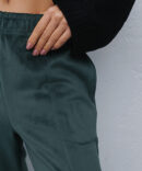 Women's emerald velour trousers with slits in the front