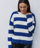 Knitted women's milky jumper in denim stripes with deflated loops at the bottom