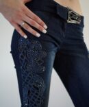 Jeans with embroidery and rhinestones on the sides and buckle