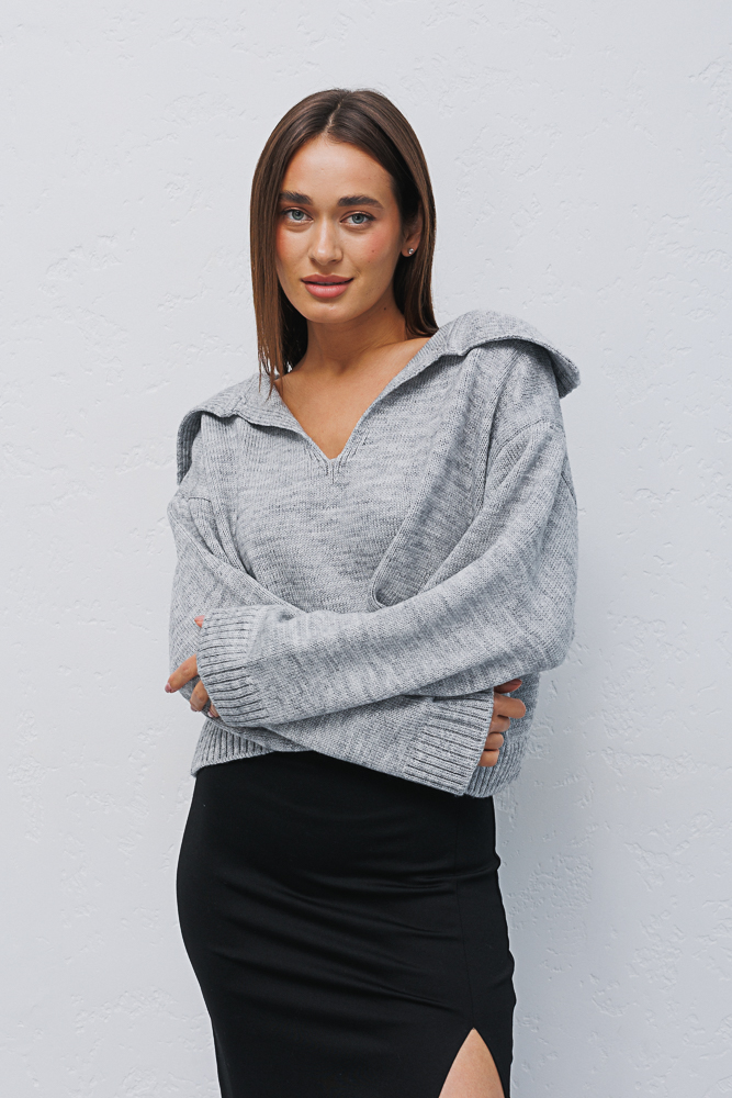 Women's knitted sweater light gray with a turn-down collar