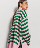 Knitted women's sweater oversize pink with green stripes