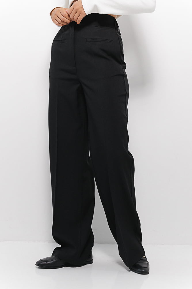 Women's classic black pants with imitation pockets on the front