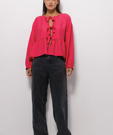 Oversize crimson blouse with bow ties on the front