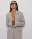 Women's mocha jacket with white lapels on the sleeves