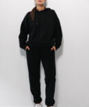 Women's black jersey tracksuit with joggers and hoodie