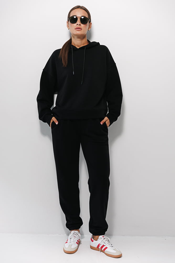 Women's black jersey tracksuit with joggers and hoodie