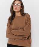 Women's oversize sweatshirt brown with an asymmetrical seam on the front