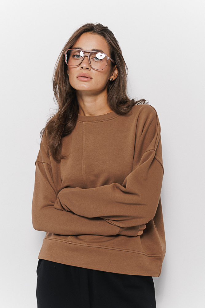 Women's oversize sweatshirt brown with an asymmetrical seam on the front