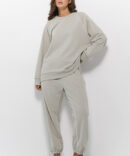 Women's sports joggers in light khaki with white piping on the front