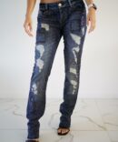 Frayed jeans with rhinestones on the front and on caramnes