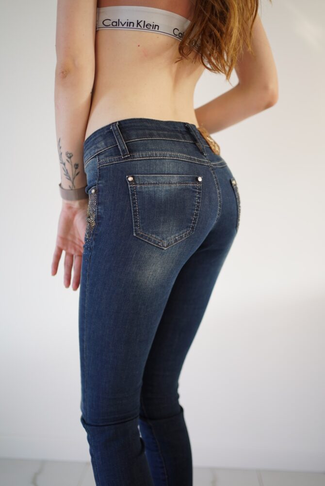 Jeans with rhinestones near the pockets