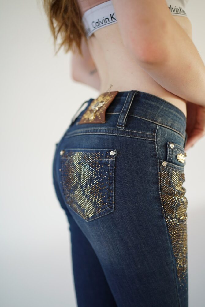 Jeans with rhinestones near the pockets