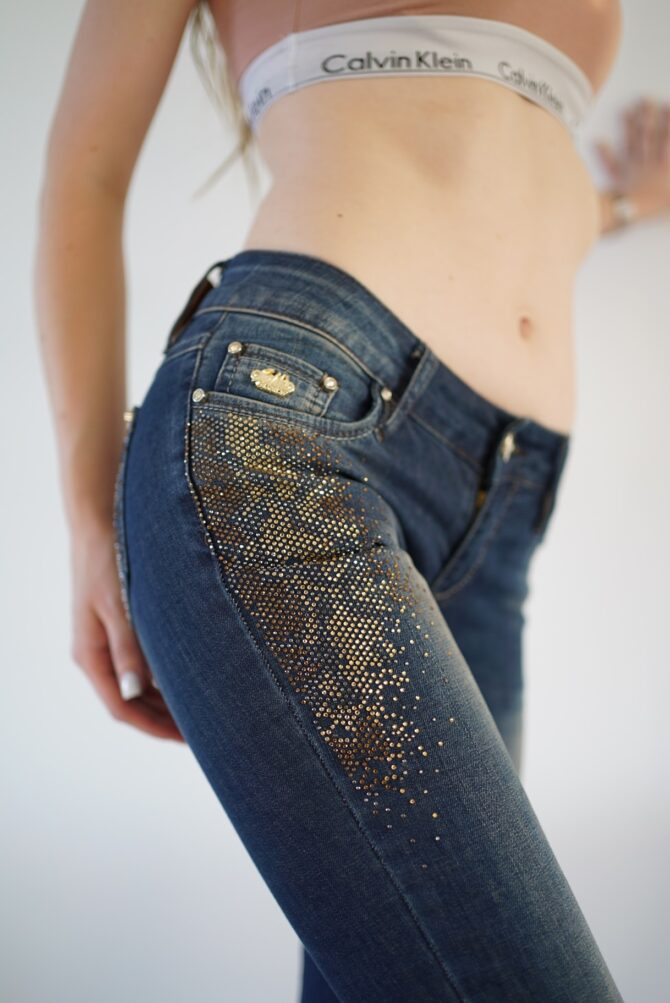 Jeans with rhinestones near the pockets