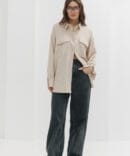 Women's oversized shirt in beige linen with chest pockets.