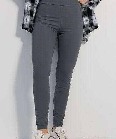 Grey women's ribbed leggings with gathering at the back.