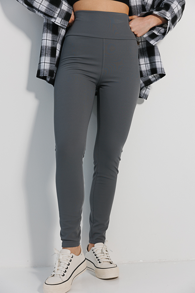 Grey women's ribbed leggings with gathering at the back.