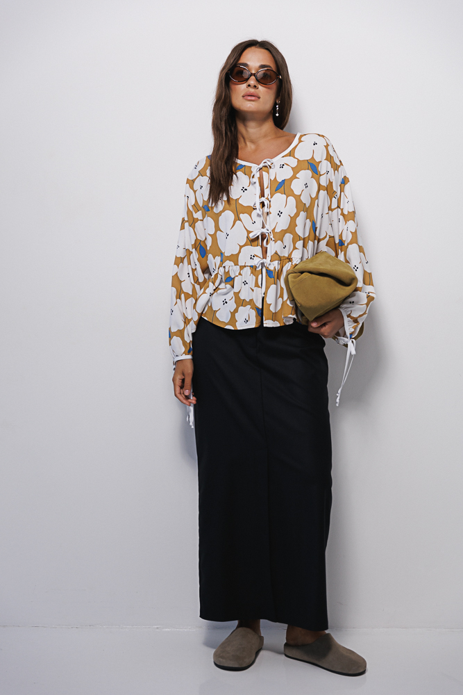 Loose mustard blouse with cream flowers and bow ties.