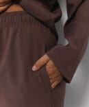 Women's suit with brown pants and sweater