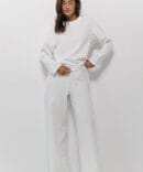 Women's suit with pants and sweater in milky color