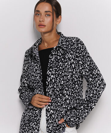 Women's shirt black with milky leopard spots