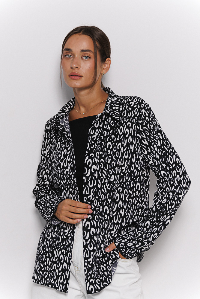 Women's shirt black with milky leopard spots