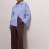 Жіноча сорчока oversize блакитна з подвійними манжетами
